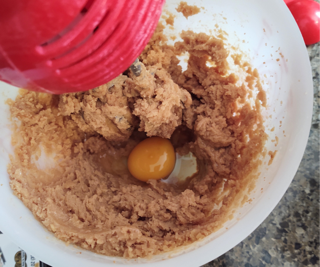 creamed butter and sugar with egg in mixing bowl