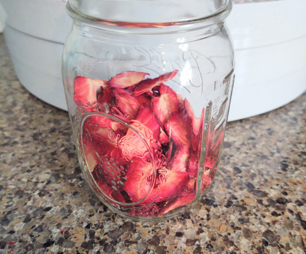 Dehydrated strawberries in glass jar