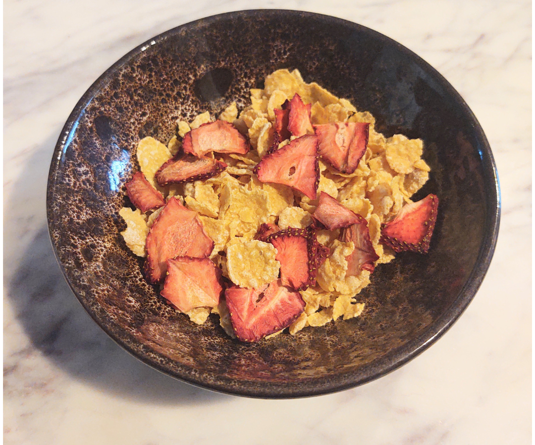 cereal with dehydrated strawberries in a bowl