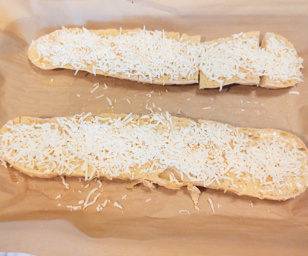 french bread with garlic butter and cheese on top
