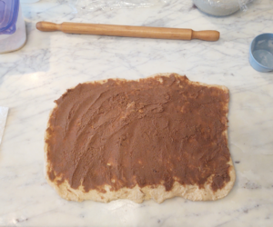 add filling to sourdough cinnamon roll dough
