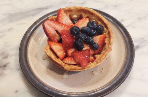 fresh milled flour waffle bowl with fruit and honey