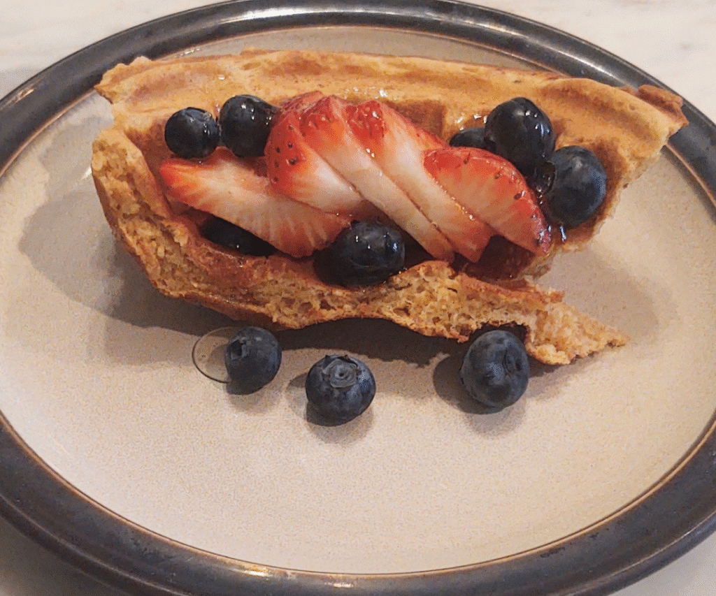 freshly milled waffle bowl with fruit and honey