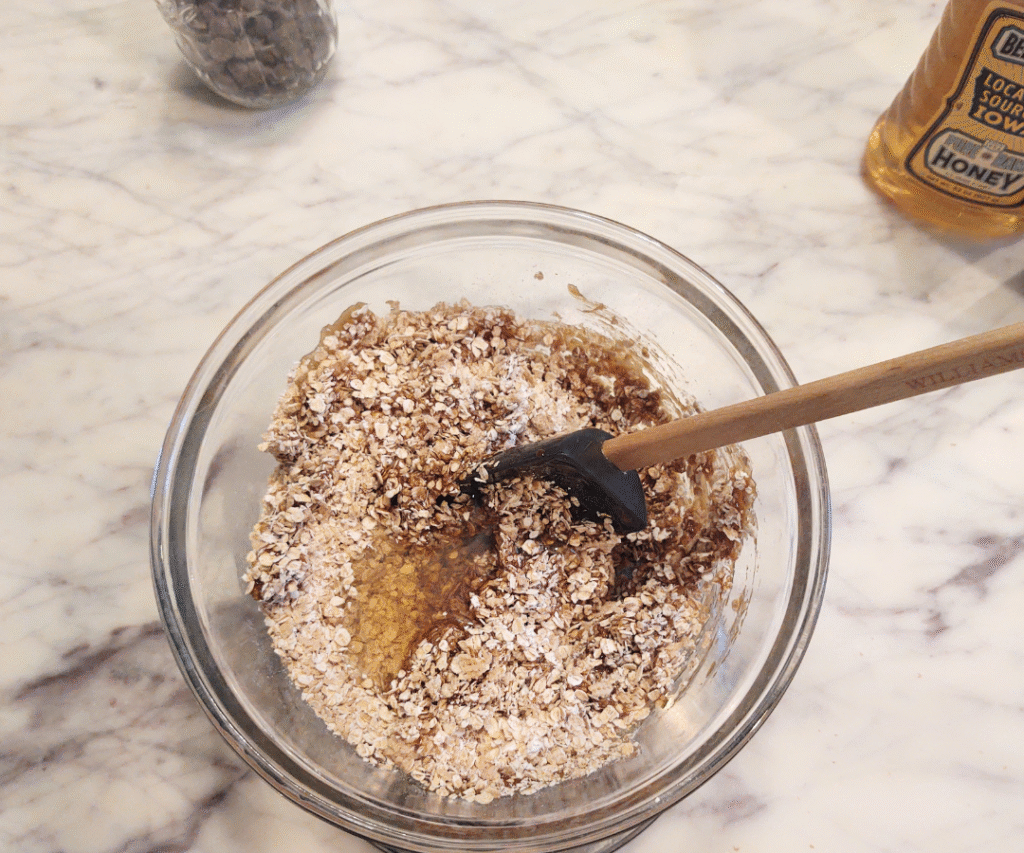 adding honey to mixture