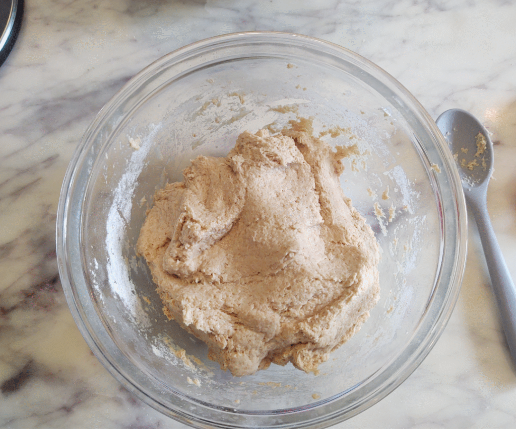 combining pizza dough