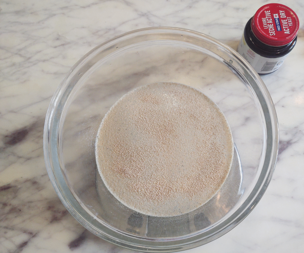 yeast sprinkled on honey water