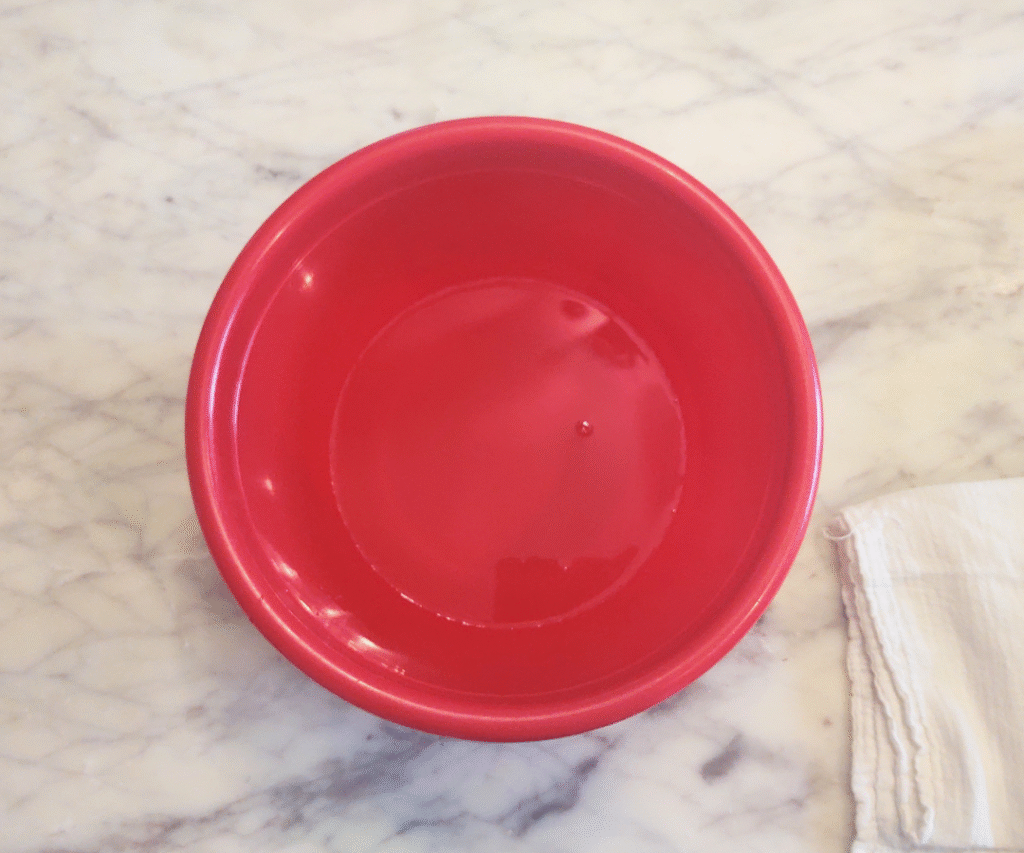 honey and water in large bowl