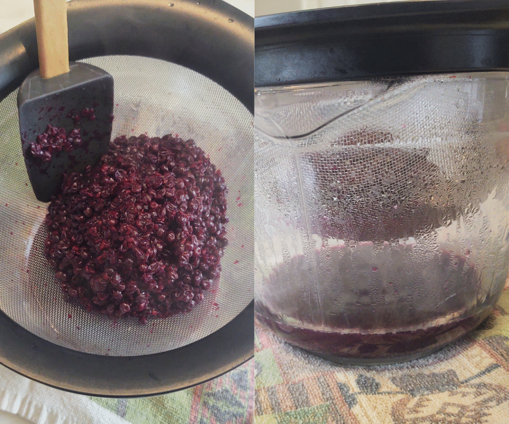 straining elderberries