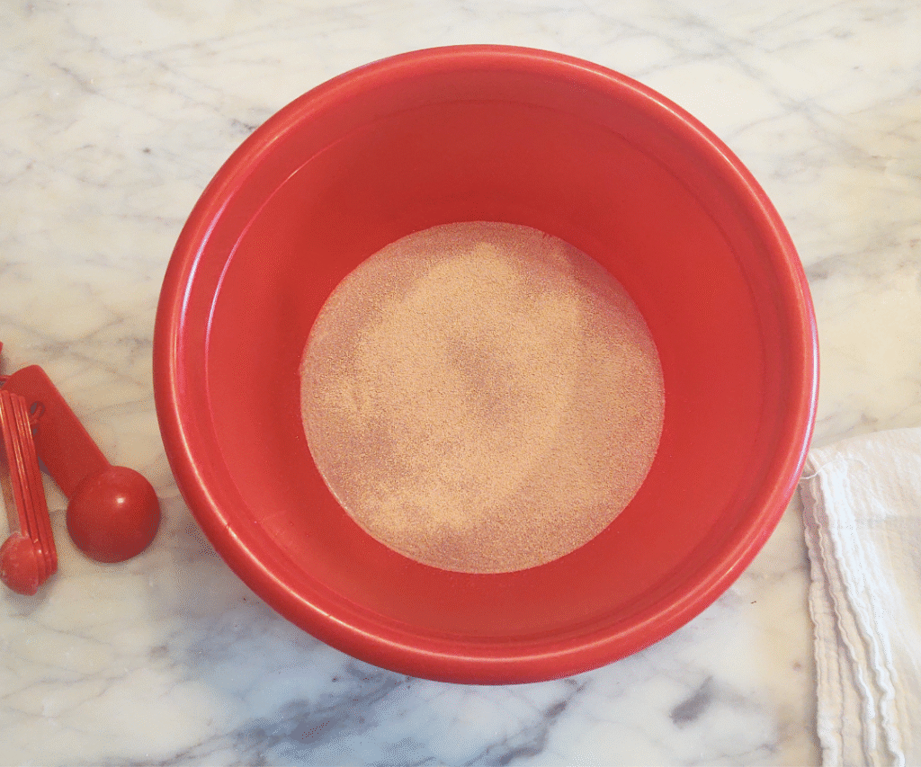 adding yeast to honey water