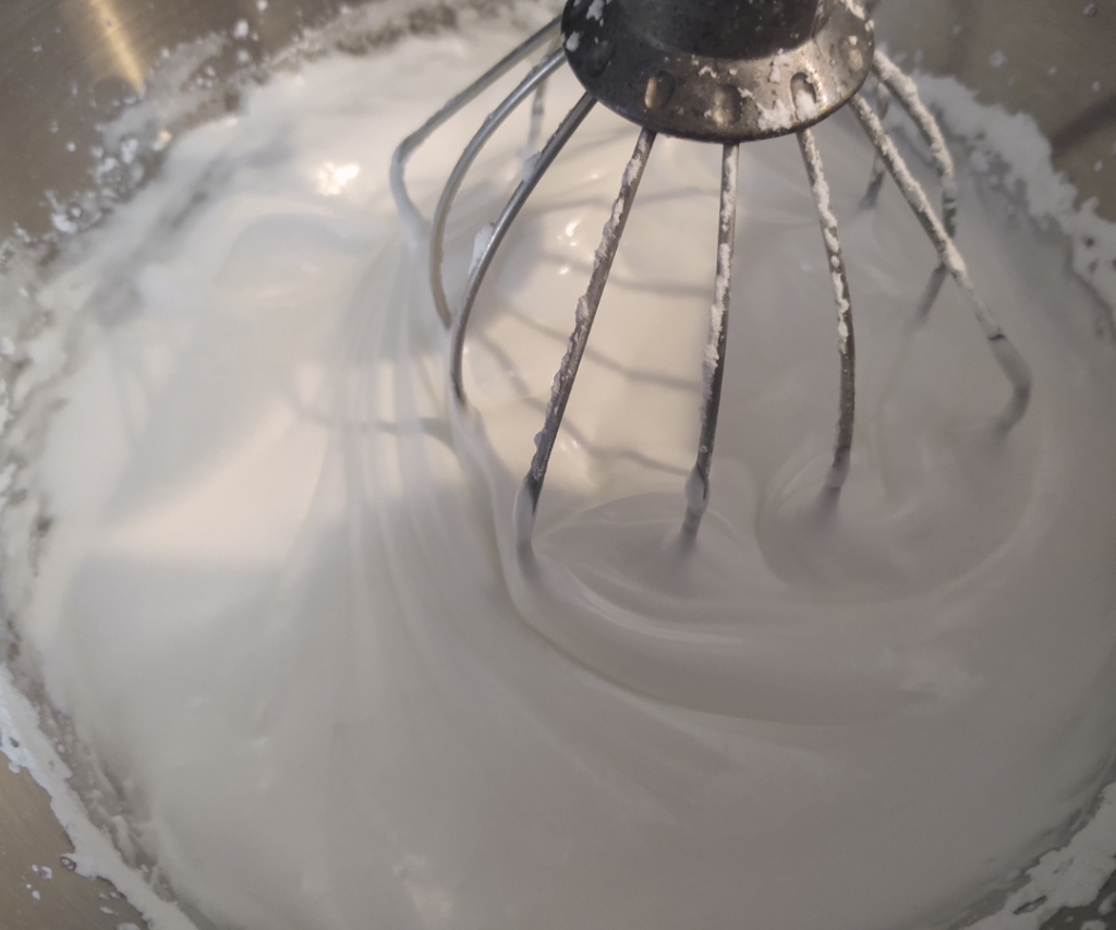 add sugar to egg whites