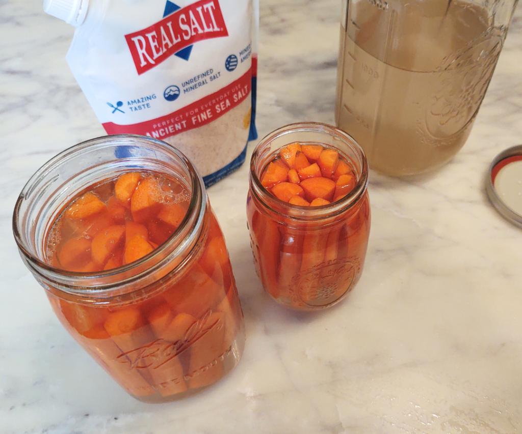 covering carrots with salt water