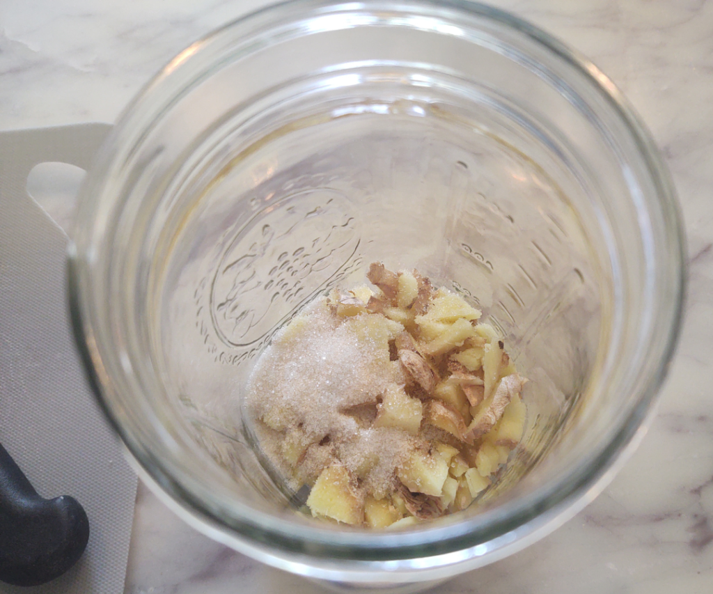 ginger and sugar in mason jar